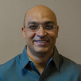 Portrait of Dr. Dhanesh Pore
